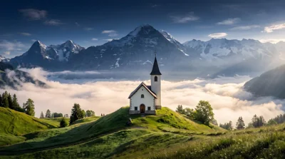 Igreja em colina com montanhas ao fundo